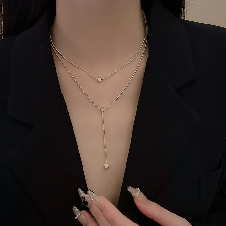 cube layered necklace